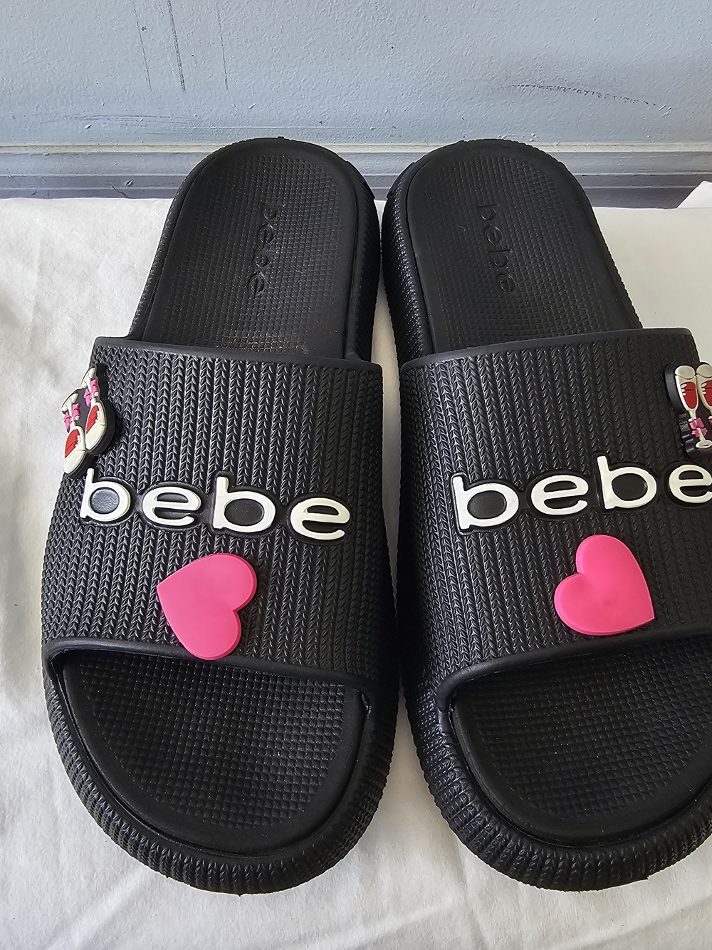 bebe Black Slide Sandals with Pink Heart Accent
